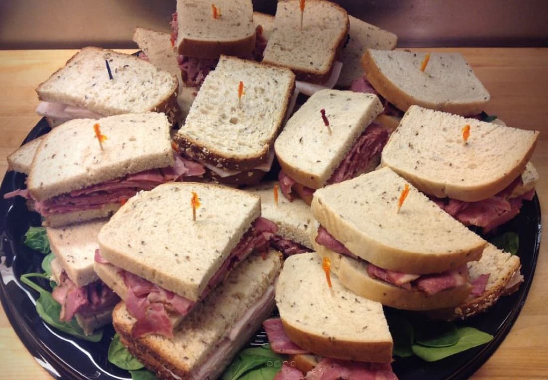 A catering sandwich platter for an office lunch