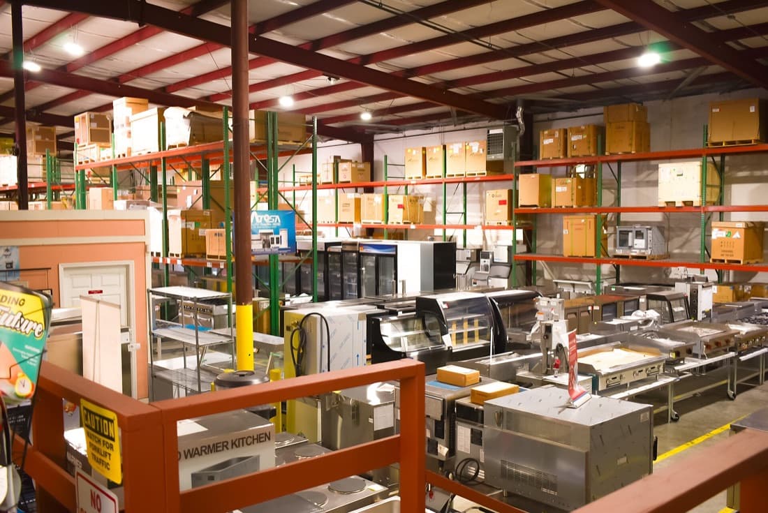 A restaurant equipment warehouse: a quote is only comparable once freight, installation, and service are included