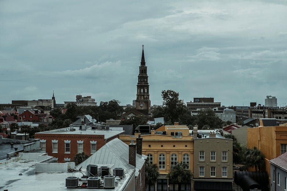 Charleston peninsula at golden hour with steeples and Cooper River
