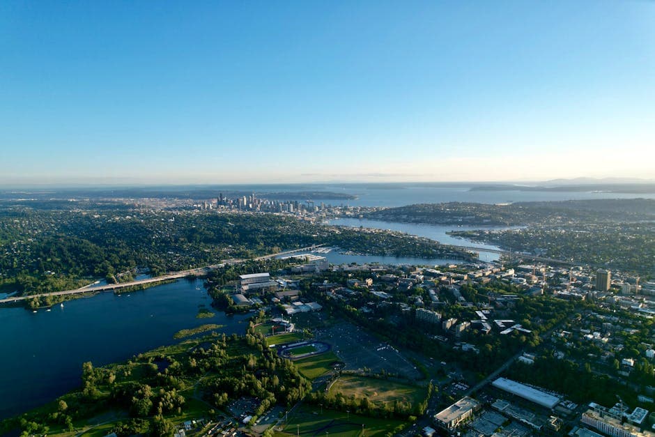 Aerial view of Everett, Washington, the Port of Everett marina on Possession Sound and the Boeing Everett Factory at Paine Field on the horizon