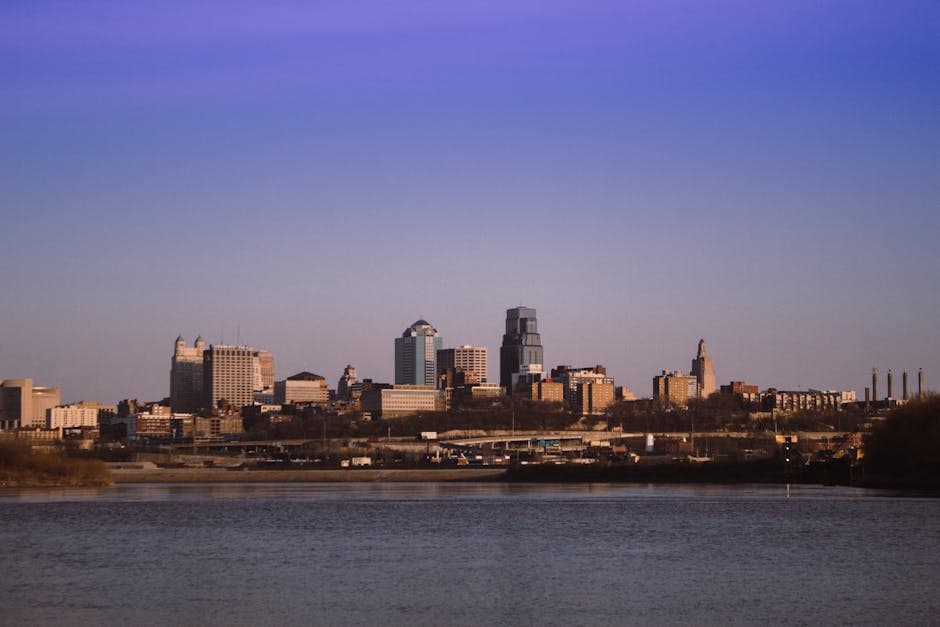 Kansas City, Missouri skyline at dusk with the downtown towers and Power and Light District in the foreground