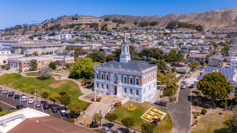 San Marcos, California, looking south across the I-15 and Highway 78 interchange toward Old California Restaurant Row and the CSUSM campus on the hill