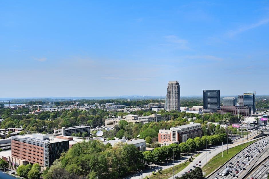 Sandy Springs with the City Springs civic complex in the foreground and the Perimeter Center corporate towers rising in the distance